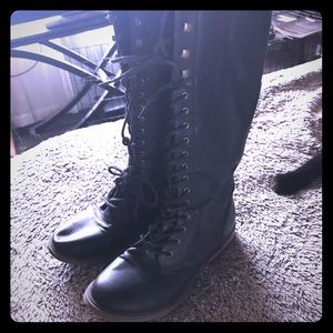 Knee high lace up combat boots